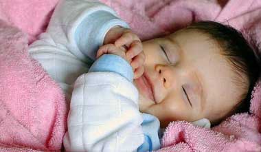 علت لبخند نوزاد در خواب,خندیدن نوزاد در خواب,علت خندیدن نوزاد در خواب